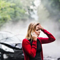 Women on Phone on Car Accident